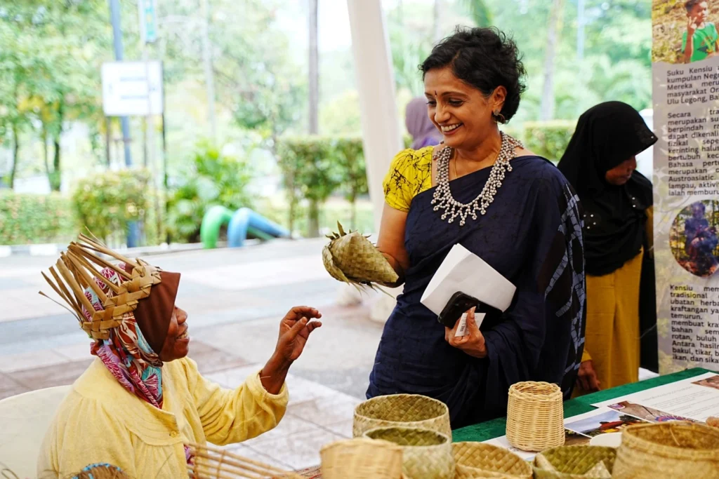 Datin Sri Umayal Eswaran engaging with beneficiaries of RYTHM Foundation’s community development programme