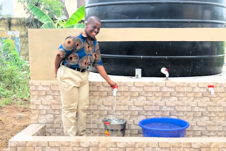 The newly installed water tank serves Aboom, a cluster of neighbouring schools, and nearly 200 households in the surrounding community.