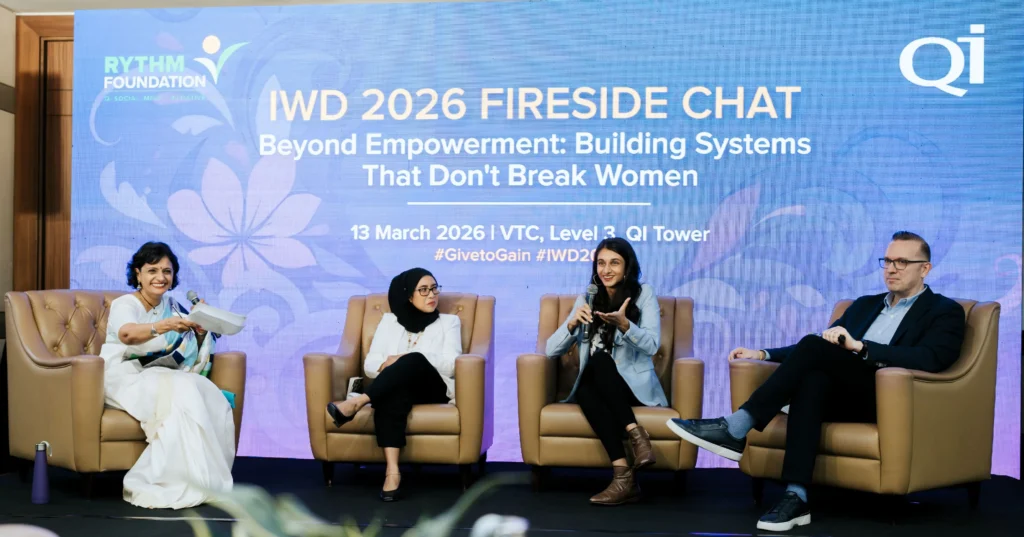Fireside chat panel discussion on workplace inclusion during International Women’s Day 2026 at QI Group.