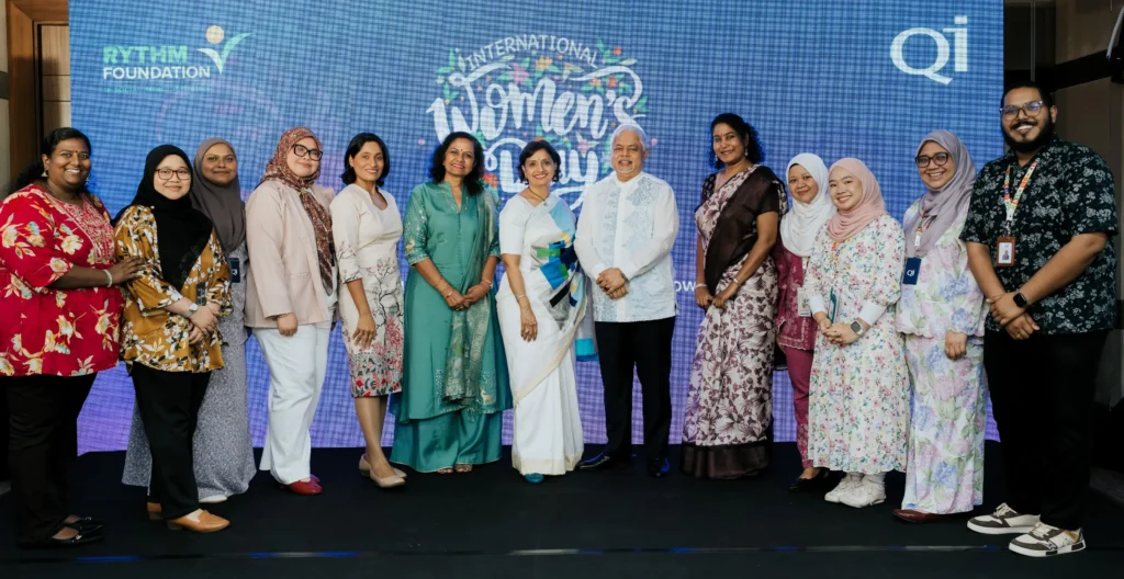 Group photo of Dato' Sri Vijay Eswaran, Datin Sri Umayal Eswaran, RYTHM Foundation team at the International Women’s Day 2026 event
