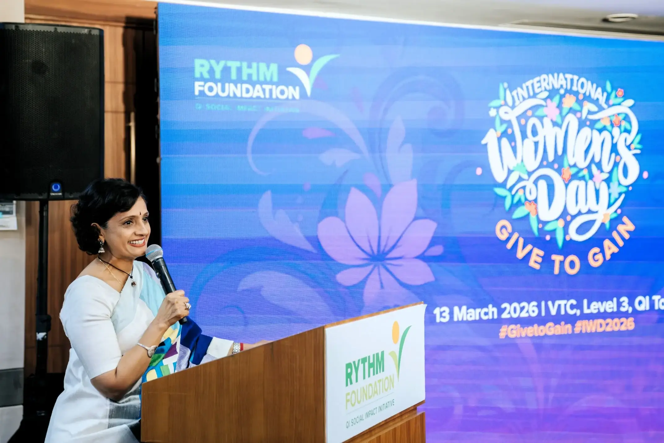 Datin Sri Umayal Eswaran delivering opening remarks at International Women’s Day 2026 at QI Group