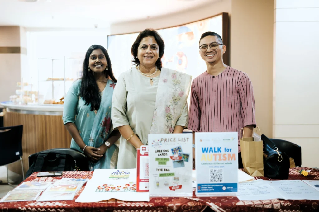 Dr Sunitha, Principal of Taarana School at the bazaar, promoting the upcoming Taarana Autism Walk 2026.