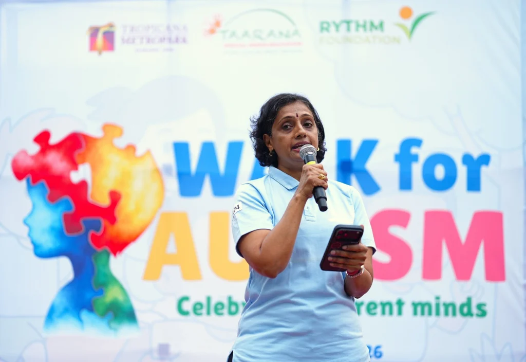 Datin Seri Umayal Eswaran addresses participants during Taarana’s Walk for Autism event.