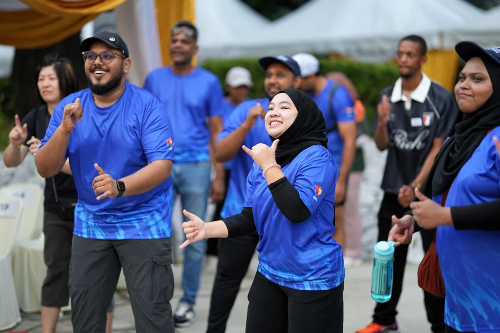 Participants join interactive exercises and movement activities promoting inclusion and community engagement.