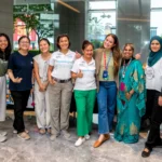 QI Group Head of Sustainability with the Earth Day vendors