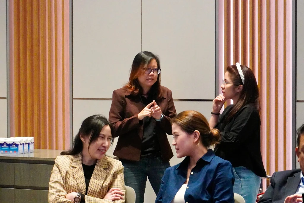Sarah Noble, QI Group's Head of Group Corporate Sustainability, engaging in discussions with fellow sustainability professionals at the UNGCMBC CSO Networking Event 2026.